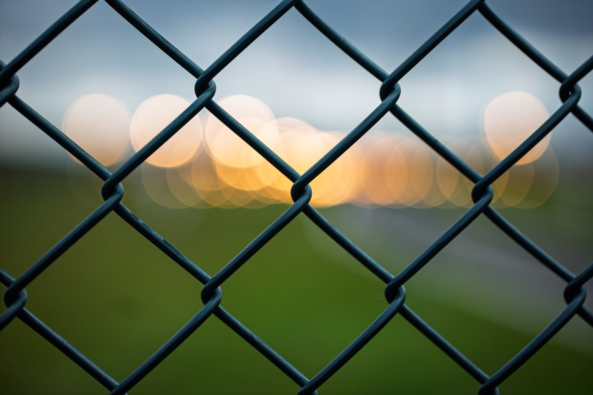 Chain link security fence installation